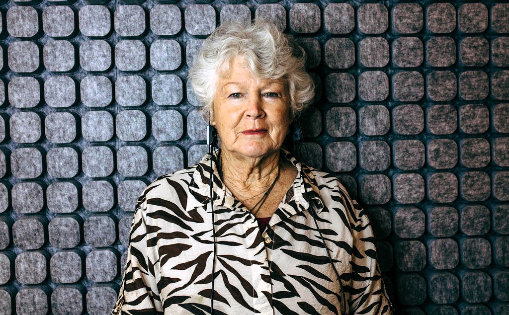Adult Hearing Test older woman in a sound proof booth on the Gold Coast